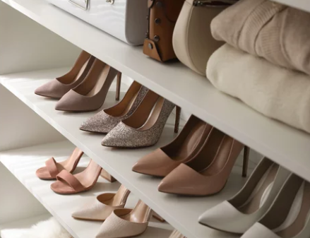 Organized closet with color-coordinated clothing